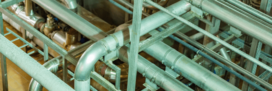 bended tubes installed in a factory created by a industrial manufacturing company with specialized equipment